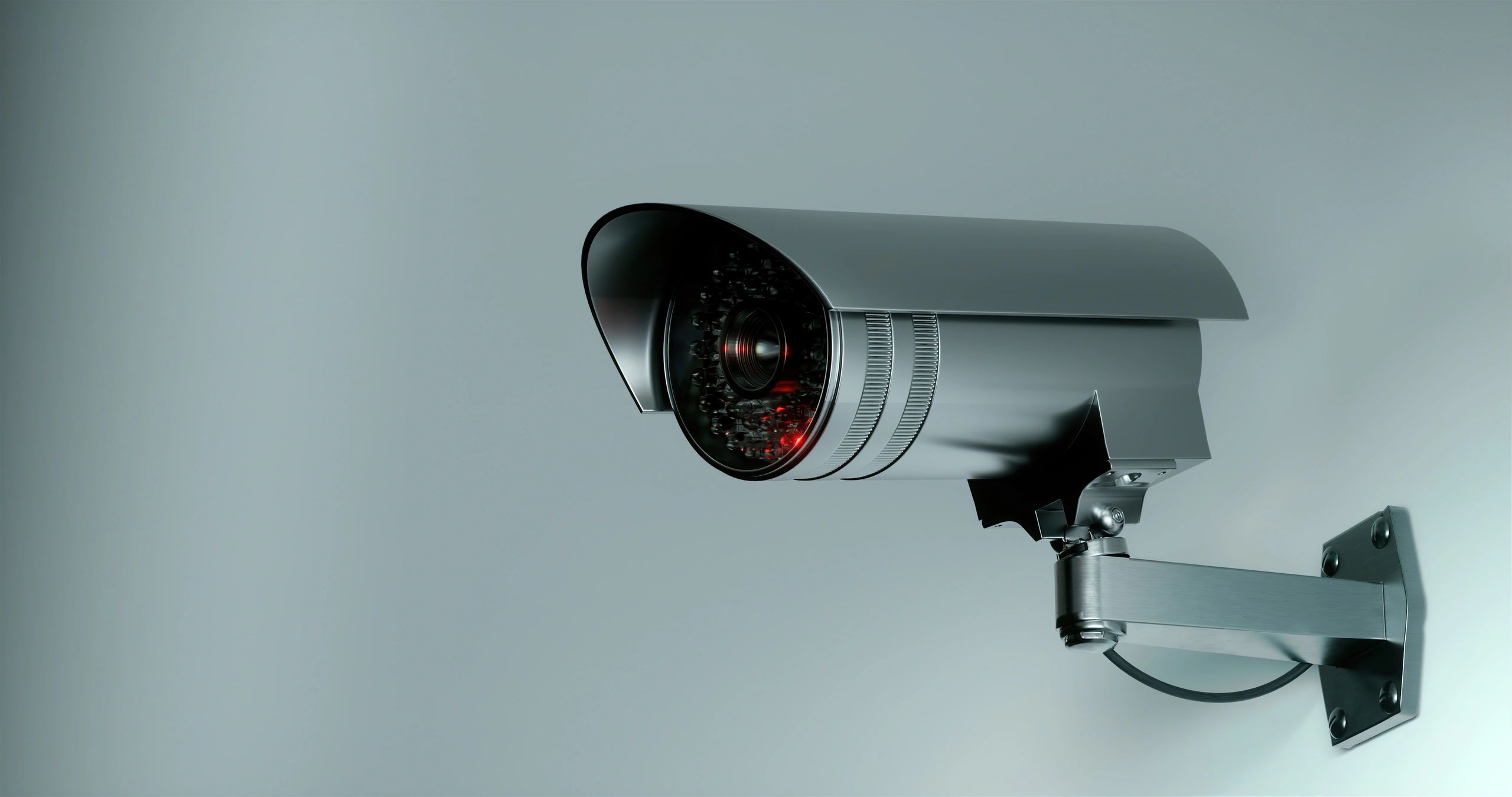 Security cameras monitoring a business property